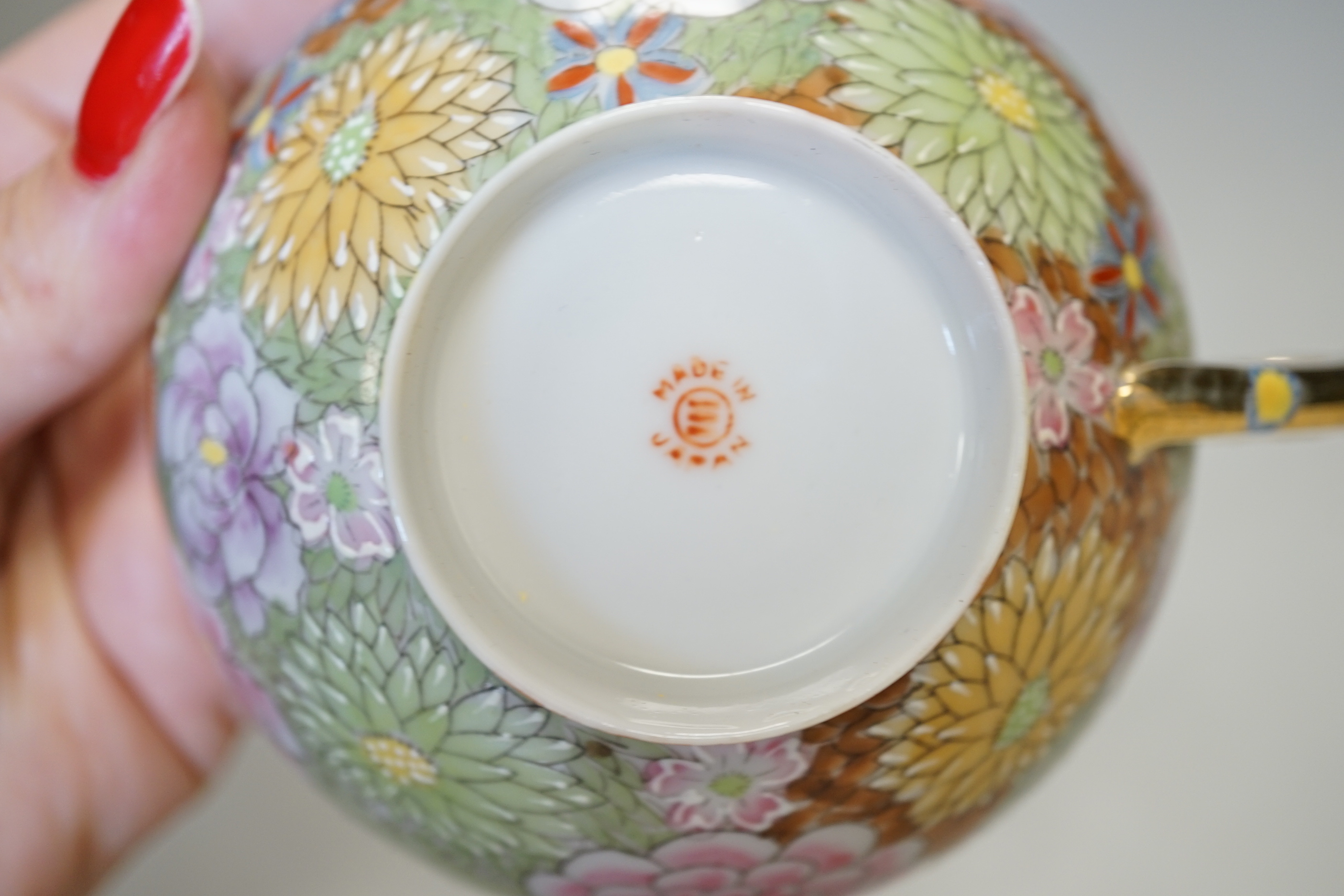 A collection of Japanese egg shell tea wares